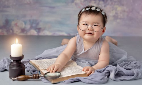 baby reading with glasses photo sydney
