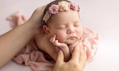 Professional newborn posing photography session capturing a baby in a peaceful and artistic pose at Blossom Brook Studio Sydney